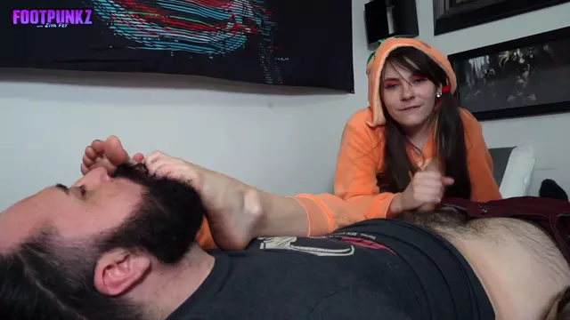 Poster: Footpunkz – Bratty Girl In Onesie Foot Smelling HJ