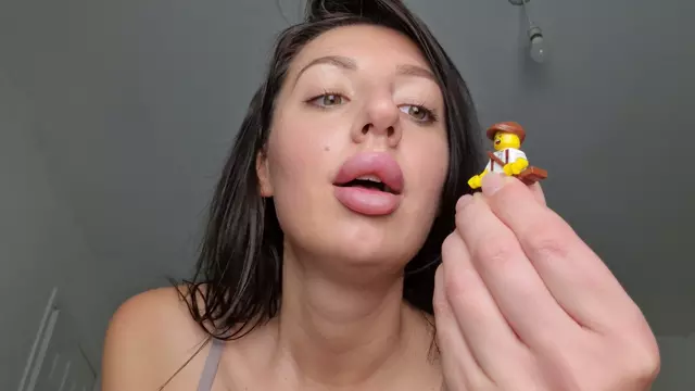 Poster: Tattooed Temptress - Vore Giantess Swallows Little Explorer - FullHD 1080p